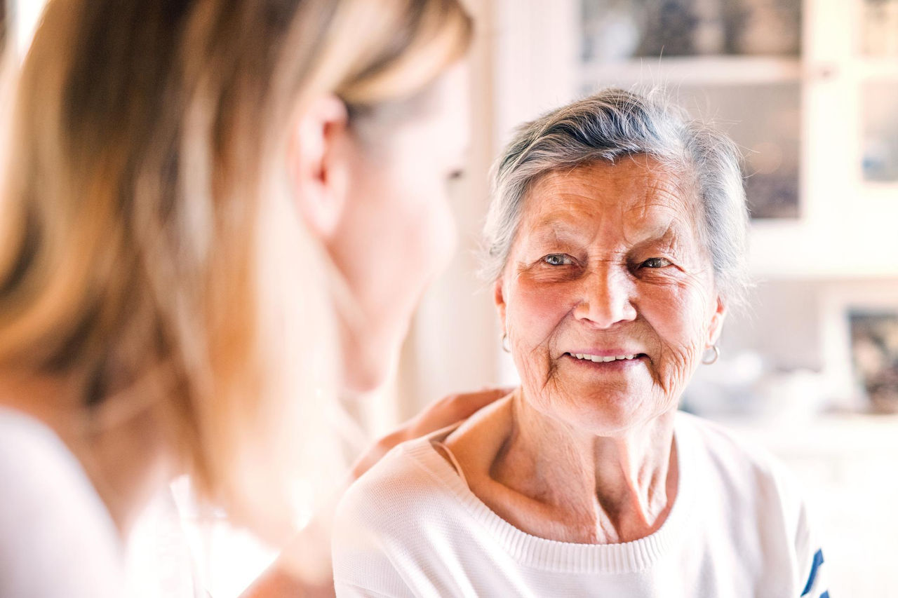 older woman with carer