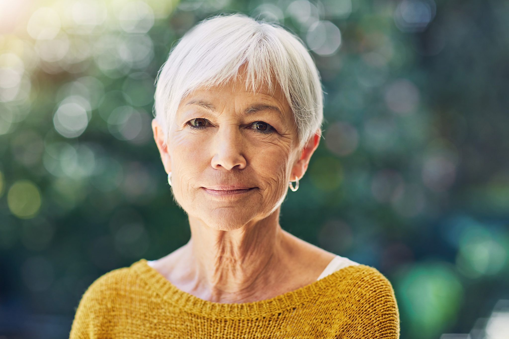 Woman in mustard yellow top