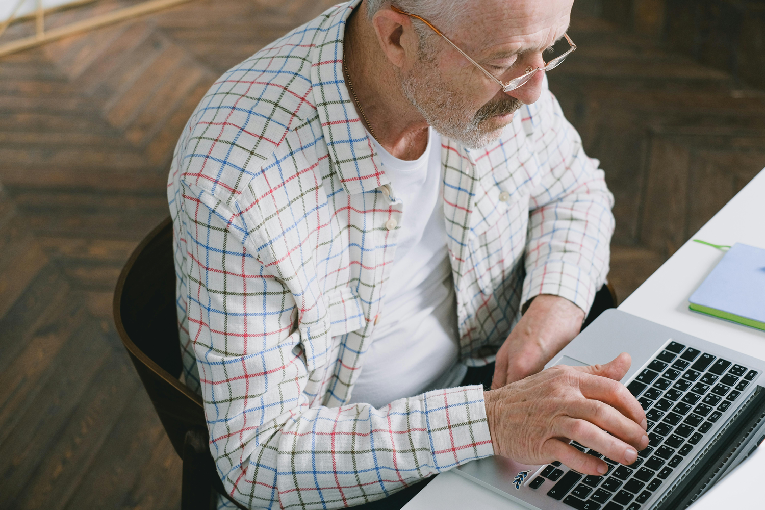 elderly man with computer
