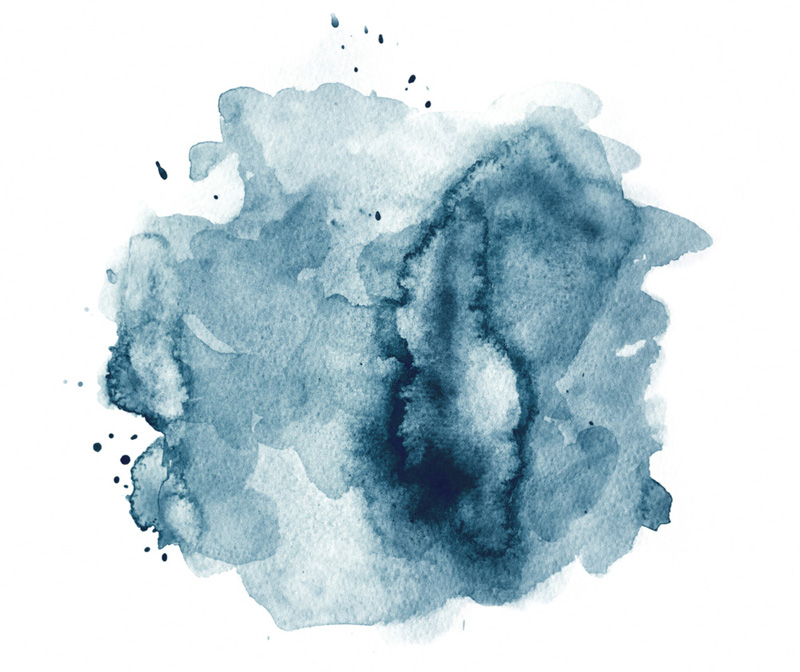 Blue watercolor splatter with splashes on white watercolor paper. My own work