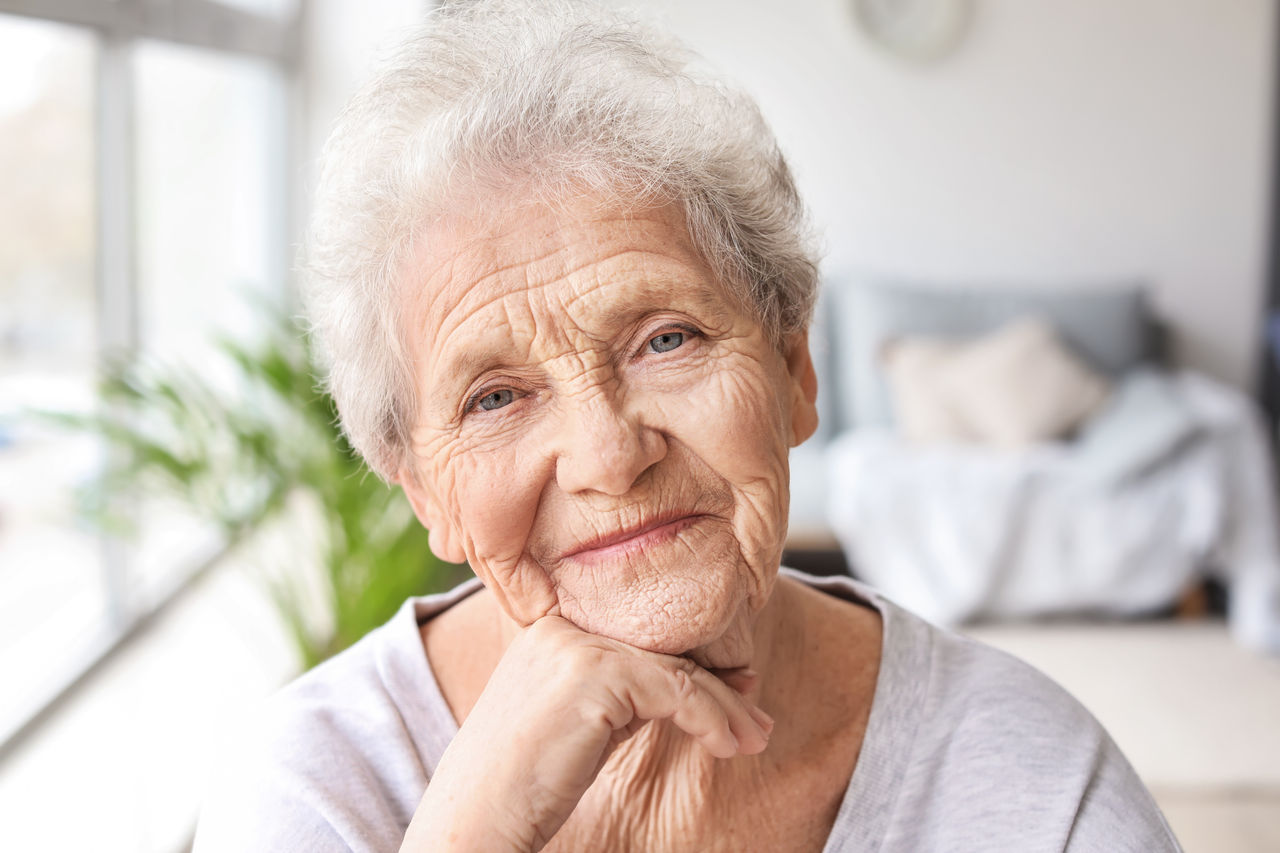 Portrait of senior woman at home